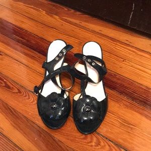 A pair of coach poppy heels, size 8